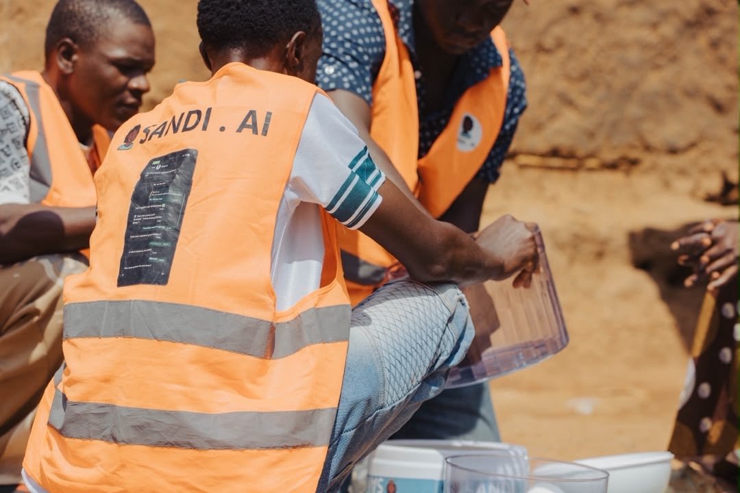 SandiLyt field team assembling household water systems